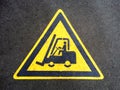 Forklift truck sign on the asphalt