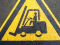 Forklift truck sign on the asphalt