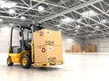 Forklift truck in warehouse or storage loading cardboard boxes. Royalty Free Stock Photo