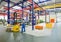 Forklift truck workers in a factory - manufacture of machinery a