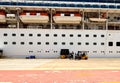 Forklift trucks loading the Crown Princess