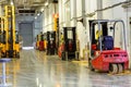 Forklift Trucks in stock. Corridor large warehouse.