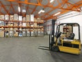 Forklift in warehouse Royalty Free Stock Photo