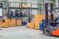 Forklifts are storing products. Within the warehouse Royalty Free Stock Photo