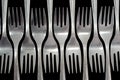 Forks on a black background Royalty Free Stock Photo