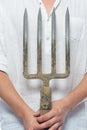 Forks for a garden in front of a farmer`s