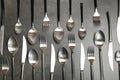 Forks, knives and spoons on table