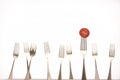 Forks & Tomato Royalty Free Stock Photo