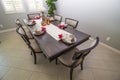 Formal Dining Room With Wooden Table & Chairs