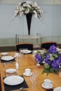 Formal dining table set up with cut flowers