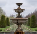 Formal flower arrangementFormal flower arrangement with water fountain in foreground at Regent`s Parkat Regent`s Park, London, UK.