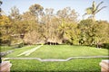 Formal garden with neat lawn and bricked path