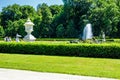 Formal garden with ornamental urns and fountain