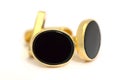 Formal gold and oval black onyx cufflinks