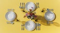 Overhead View of Formal Table Setting With White Plates, Silverware, Flowers, and Candles Royalty Free Stock Photo