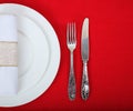 Formal table setting on red tablecloth Royalty Free Stock Photo