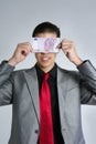 Formal young businessman with 500 euro note Royalty Free Stock Photo