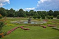 Forman gardens of Schonbrunn Palace with fountain in Vienna.