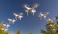 Formation of Drones Swarm in the Blue Sky Royalty Free Stock Photo