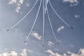 Formation of five airplanes in the sky at an air show