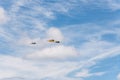 Formation flying of three old biplane aircrafts during air show