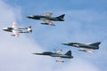 Formation of former Swiss Air force jet aircraft comprised of a de Havilland Vampire, Hawker Hunter, Northrop F-5 and Dassault Mir