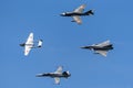 Formation of former Swiss Air force jet aircraft comprised of a de Havilland Vampire, Hawker Hunter, Northrop F-5 and Dassault Mir