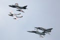 Formation of former Swiss Air force jet aircraft comprised of a de Havilland Vampire, Hawker Hunter, Northrop F-5 and Dassault