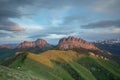 The formation and movements of clouds up to the steep slopes of the mountains of Central Caucasus peaks.