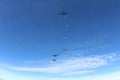 Formation skydiving. Skydivers are falling in the sky.