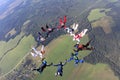 Formation skydiving. Skydivers have done a circle in the sky.