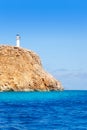 Formentera Barbaria cape Lighthouse view from sea Royalty Free Stock Photo