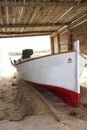 Formentera boat stranded on wooden rails Royalty Free Stock Photo