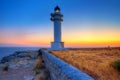 Formentera sunset in Barbaria cape lighthouse Royalty Free Stock Photo