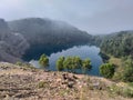 a former coal mining basin that has turned into a lake and is named the blue lake Royalty Free Stock Photo
