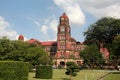 Former colonial red brick High Court Building with its clock tower, Yangon, Myanmar