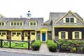 Former Estate Carriage House with Yellow Trim