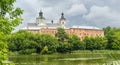 Panorama of medieval Discalced Carmelites monastery over water, Berdychiv, Ukraine