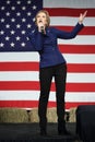 Former HP exec Carly Fiorina gestures in front of US flag