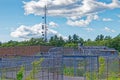 Former prison with coiled barbed wire top of fence