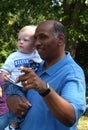 Former republican governor Steele of Maryland with a small child in Greenbelt, Maryland