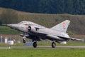 Former Swiss Air Force Dassault Mirage III fighter aircraft J-2012 HB-RDF flying in formation with a Hawker Hunter Royalty Free Stock Photo