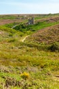 Former tin mine in a field under the sunlight in Cornwall in the UK Royalty Free Stock Photo