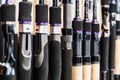 Forms of fishing rods and spinning rods on the counter in the store Royalty Free Stock Photo