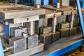 Forms for a hydraulic press on a rack. industrial metalworking machines. Close-up of hydraulic press stamping molds in an