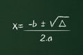 Formula of bhaskara. illustration of high school equation written in chalk on blackboard. mathematical operation. Royalty Free Stock Photo