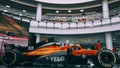 Formula 1. McLaren racing caÃÂº on stand exhibition Editorial. Sport car background side view.