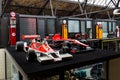 Formula One racing cars McLaren M26 1976 and Marussia MR02 2013.