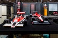 Formula One racing cars McLaren M26 1976 and Marussia MR02 2013.
