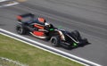 Formula 2 race car on a speed track with motion blur Royalty Free Stock Photo